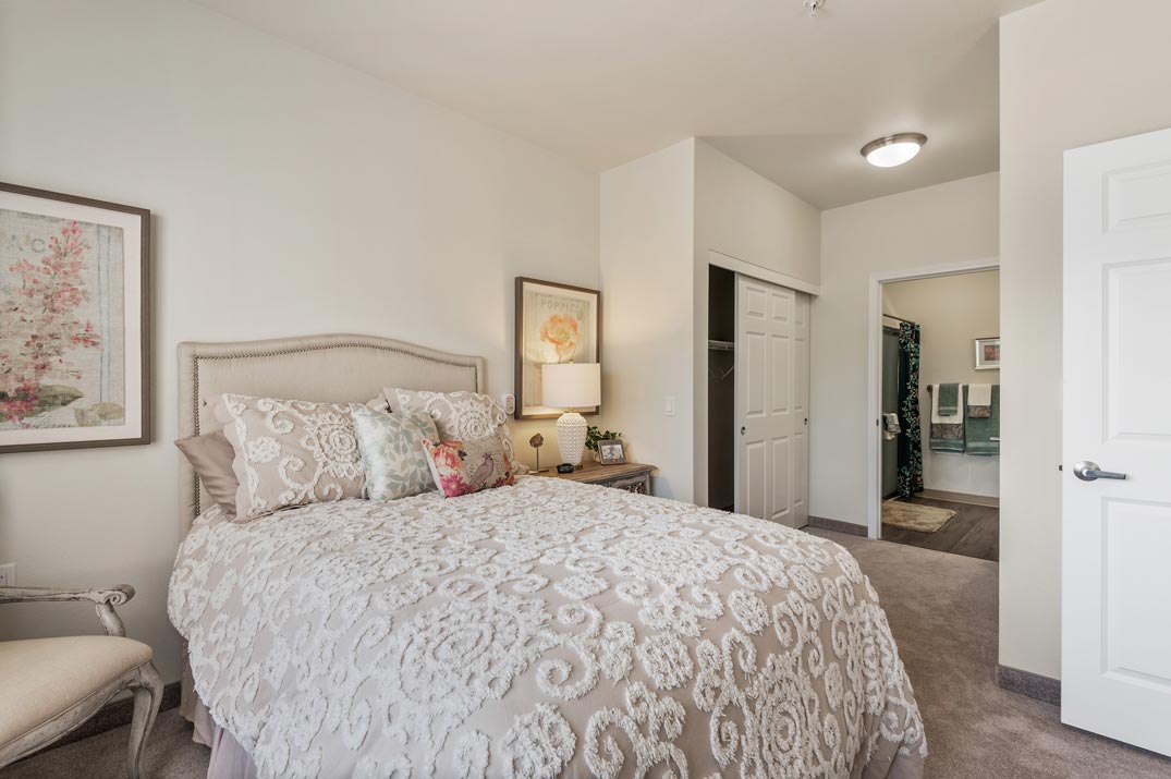 A furnished bedroom in a StoneRidge apartment